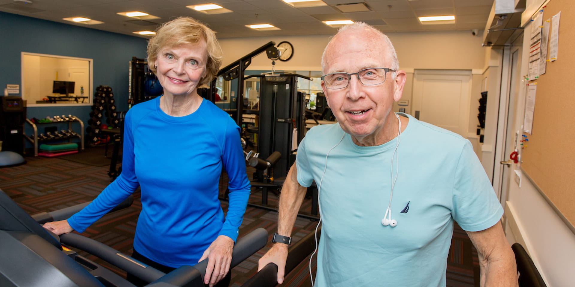man and woman in the gym