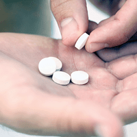 Medication, pills in the palm of a hand | Doylestown Health
