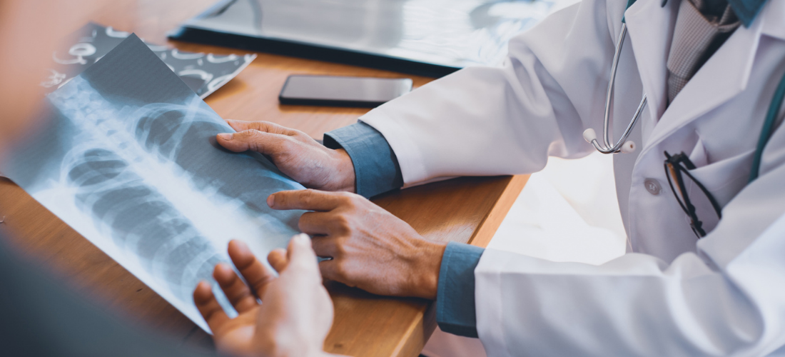 Provider reviewing an X-Ray with a patient | Doylestown Health